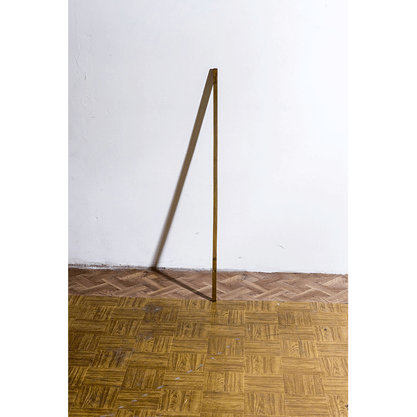 PETER PUKLUS<br/>5093 A wooden stick leaning against the wall, 2013, analogue print on color-paper, 36 x 24,7 cm, ed. 5